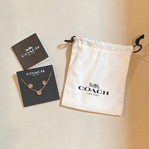 Coach rose gold earring and necklace set